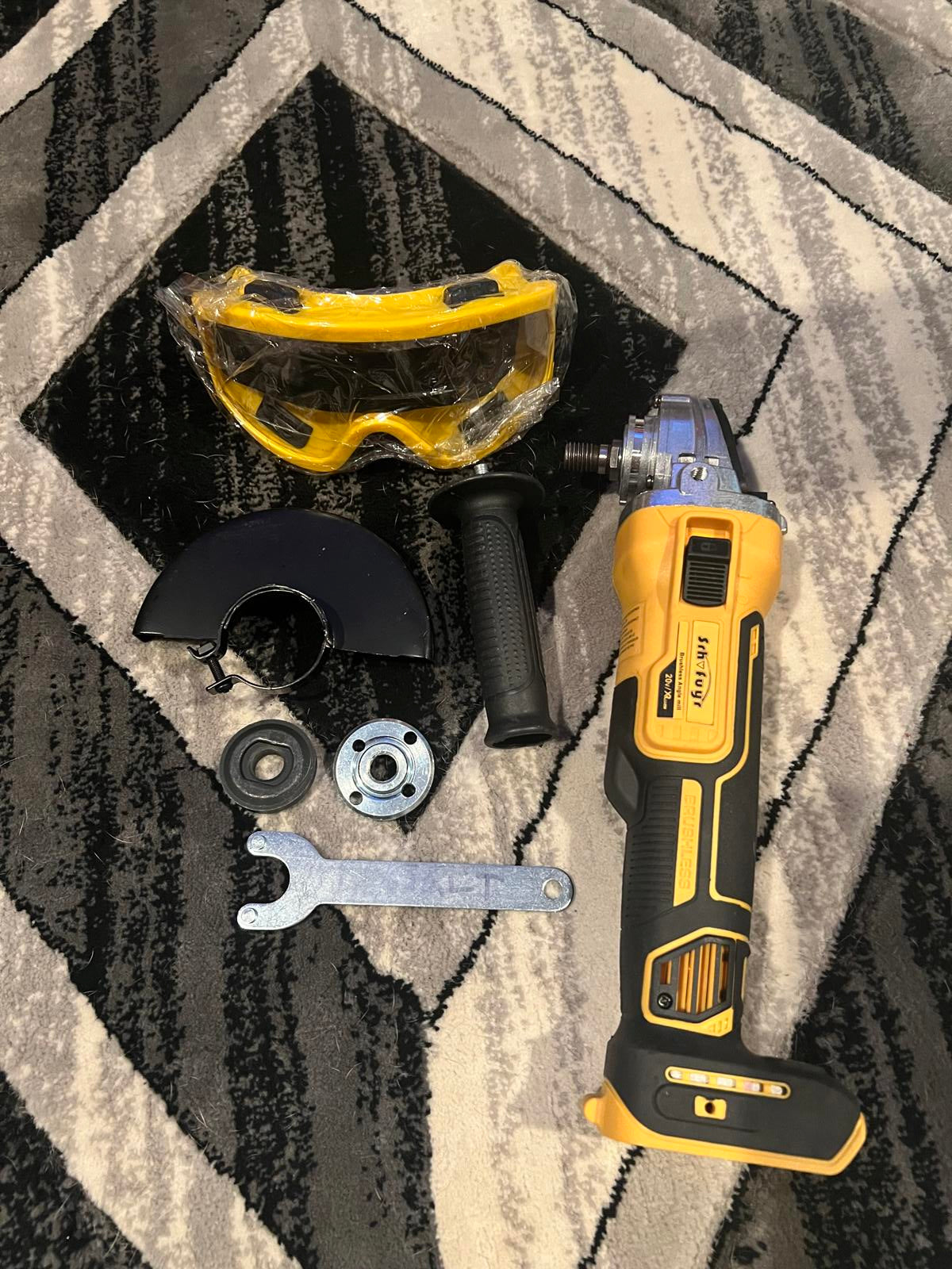 Cordless Angle Grinder with Safety Gear and Accessories