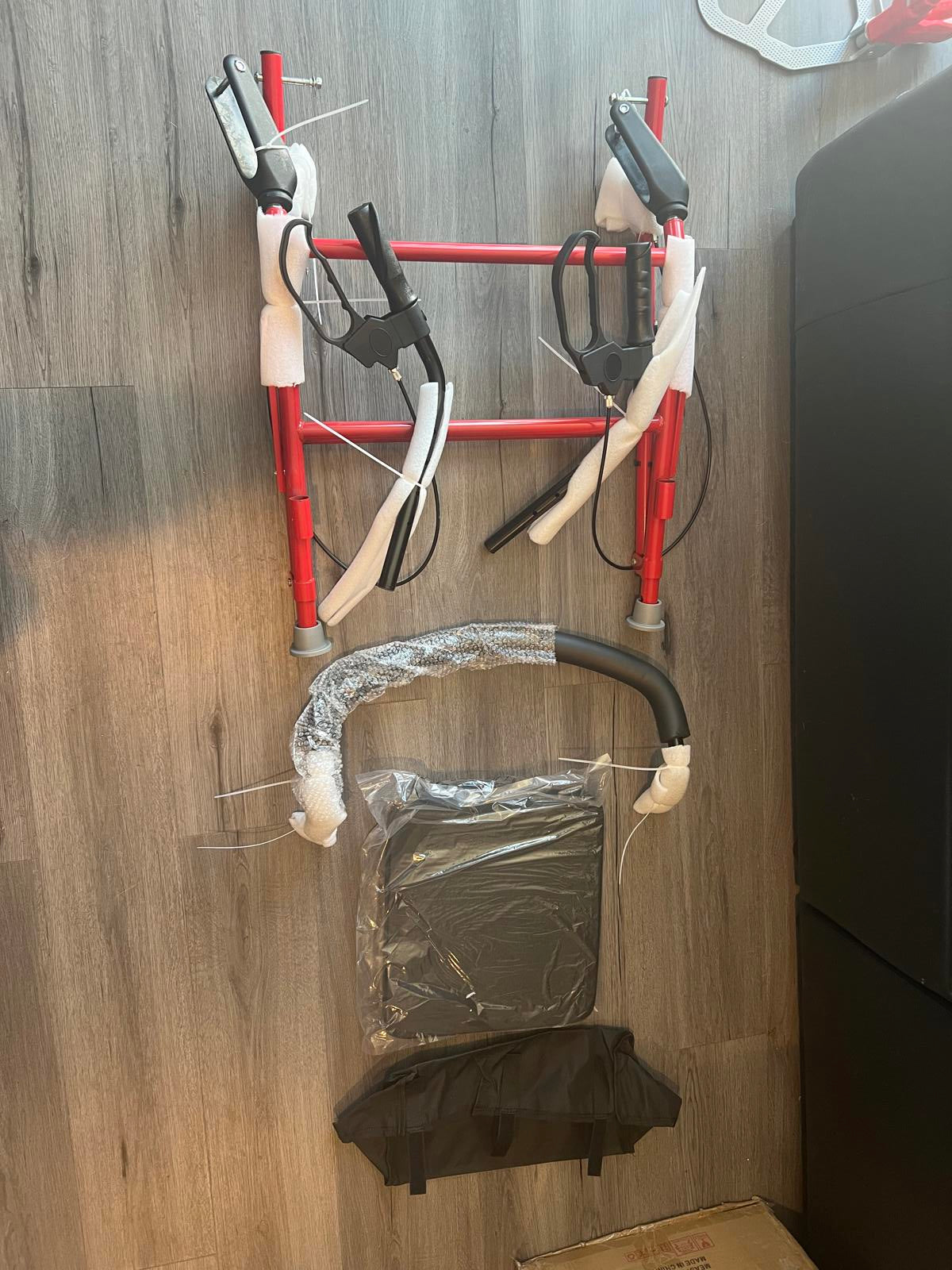 Foldable Red Walker with Seat and Carry Bag - missing wheels