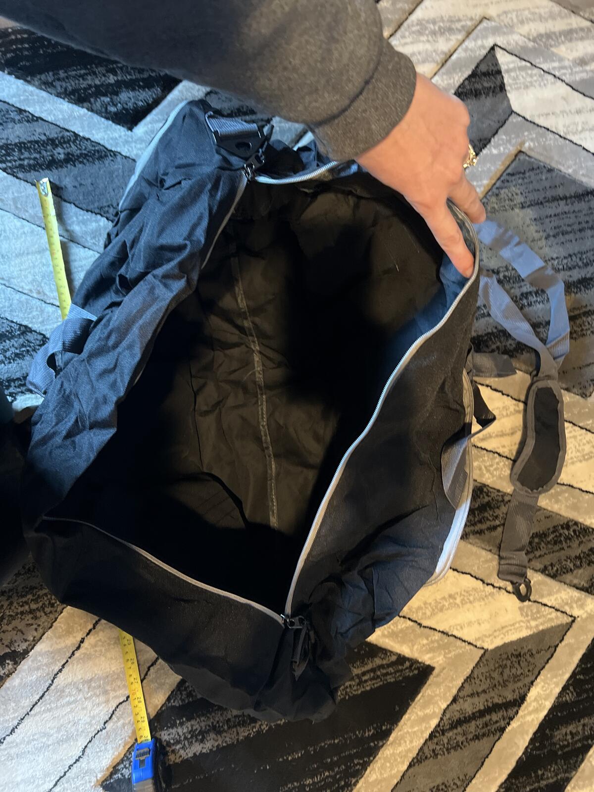 Large Black Duffel Bag with Shoulder Strap and Multiple Pockets