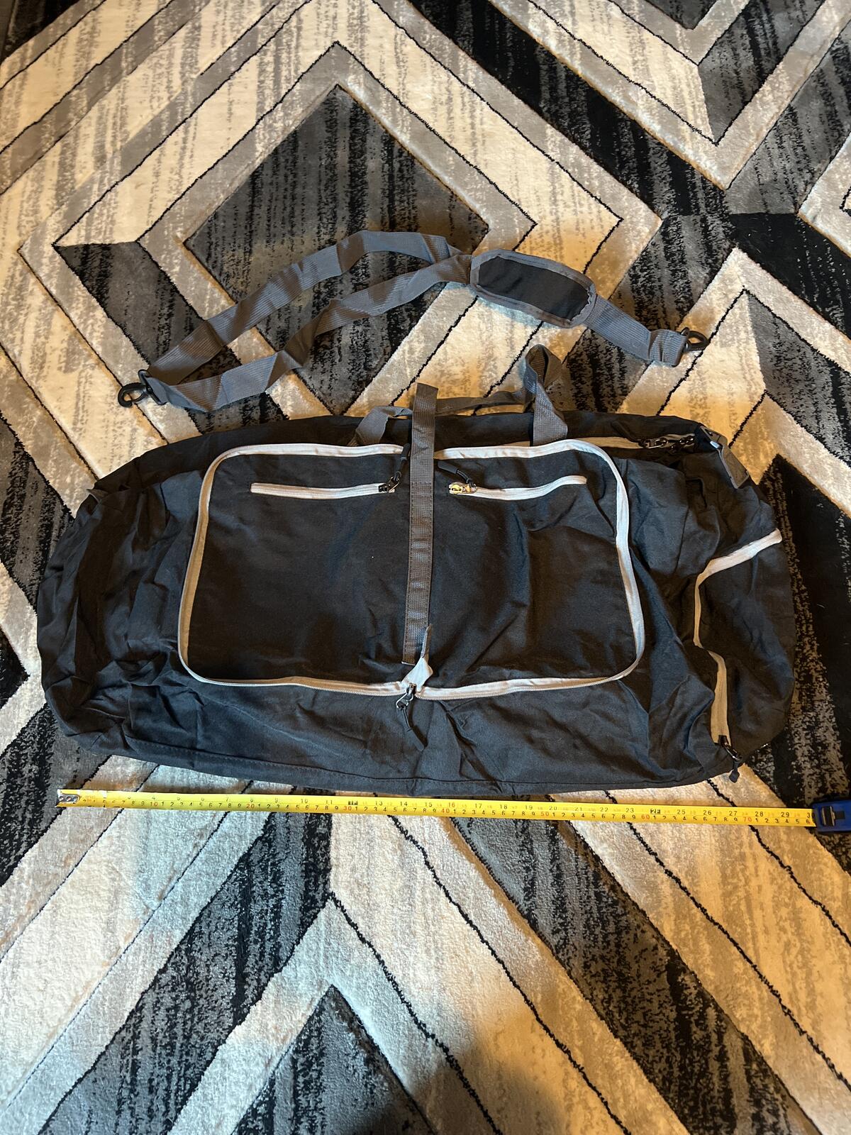 Large Black Duffel Bag with Shoulder Strap and Multiple Pockets