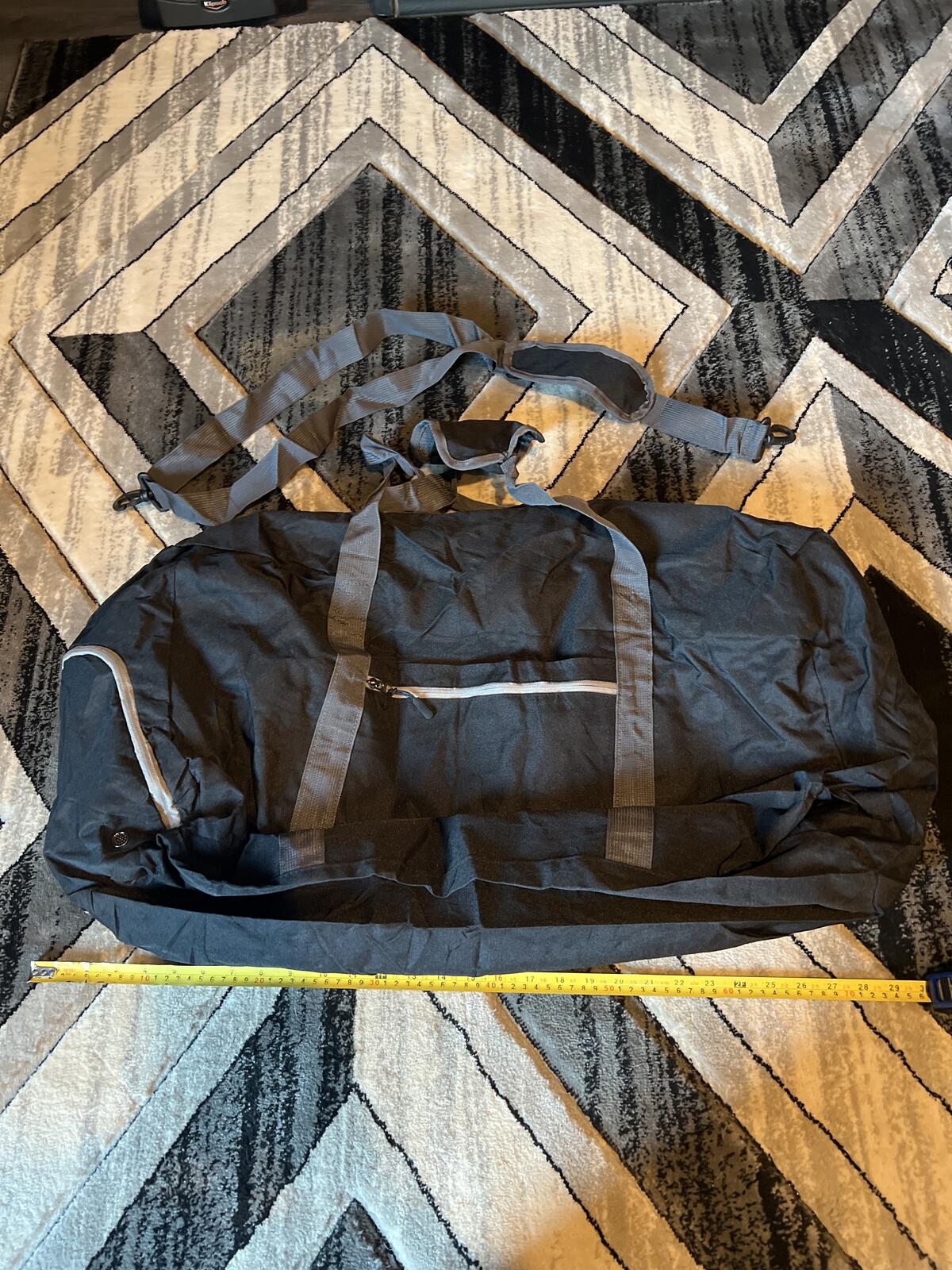 Large Black Duffel Bag with Shoulder Strap and Multiple Pockets